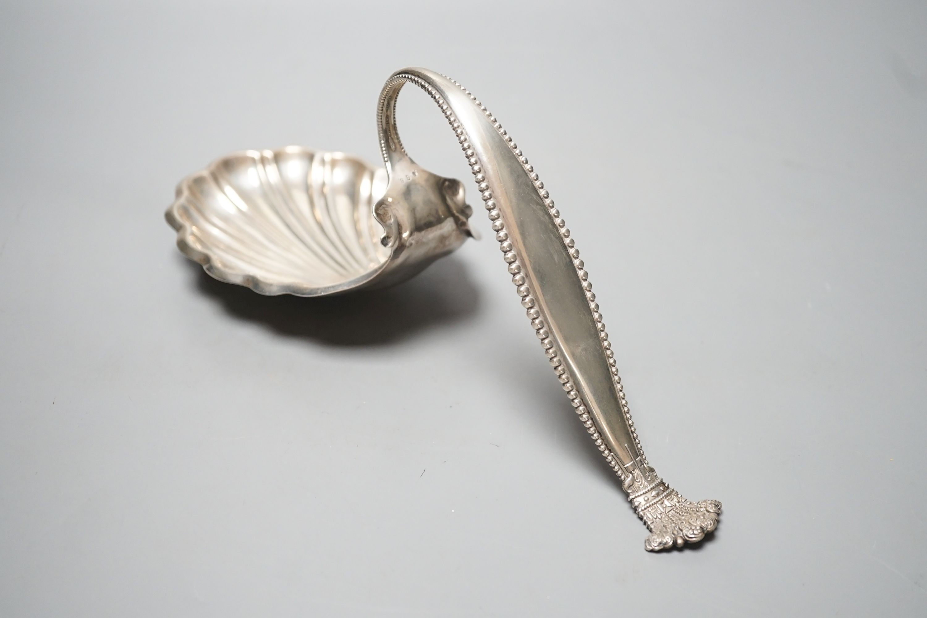 A sterling spoon shaped shell dish, by George W Schleiber & Co, 26.5cm, 6oz.